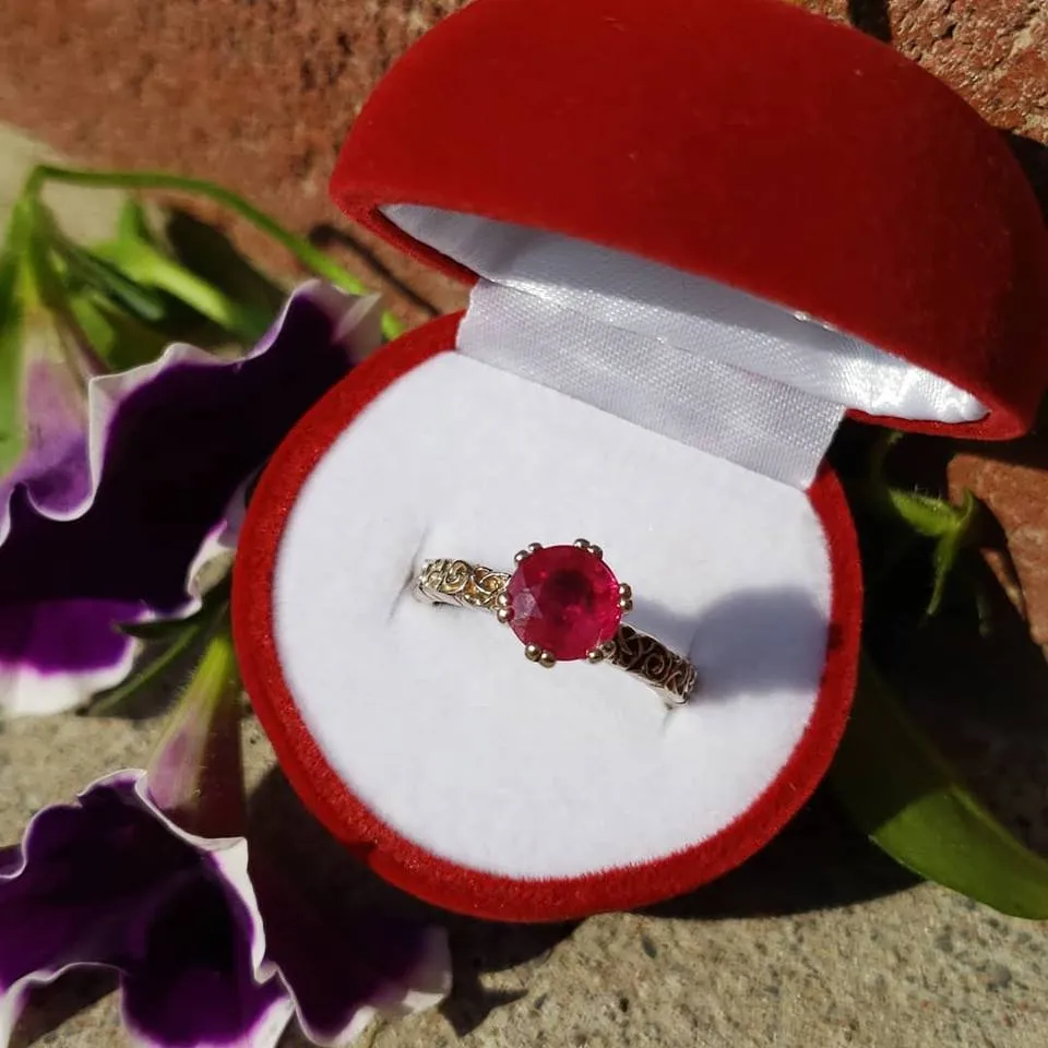 Ruby Solitaire on a Trinity Scroll Band in 14K White Gold