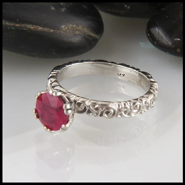 Ruby Solitaire on a Trinity Scroll Band in 14K White Gold